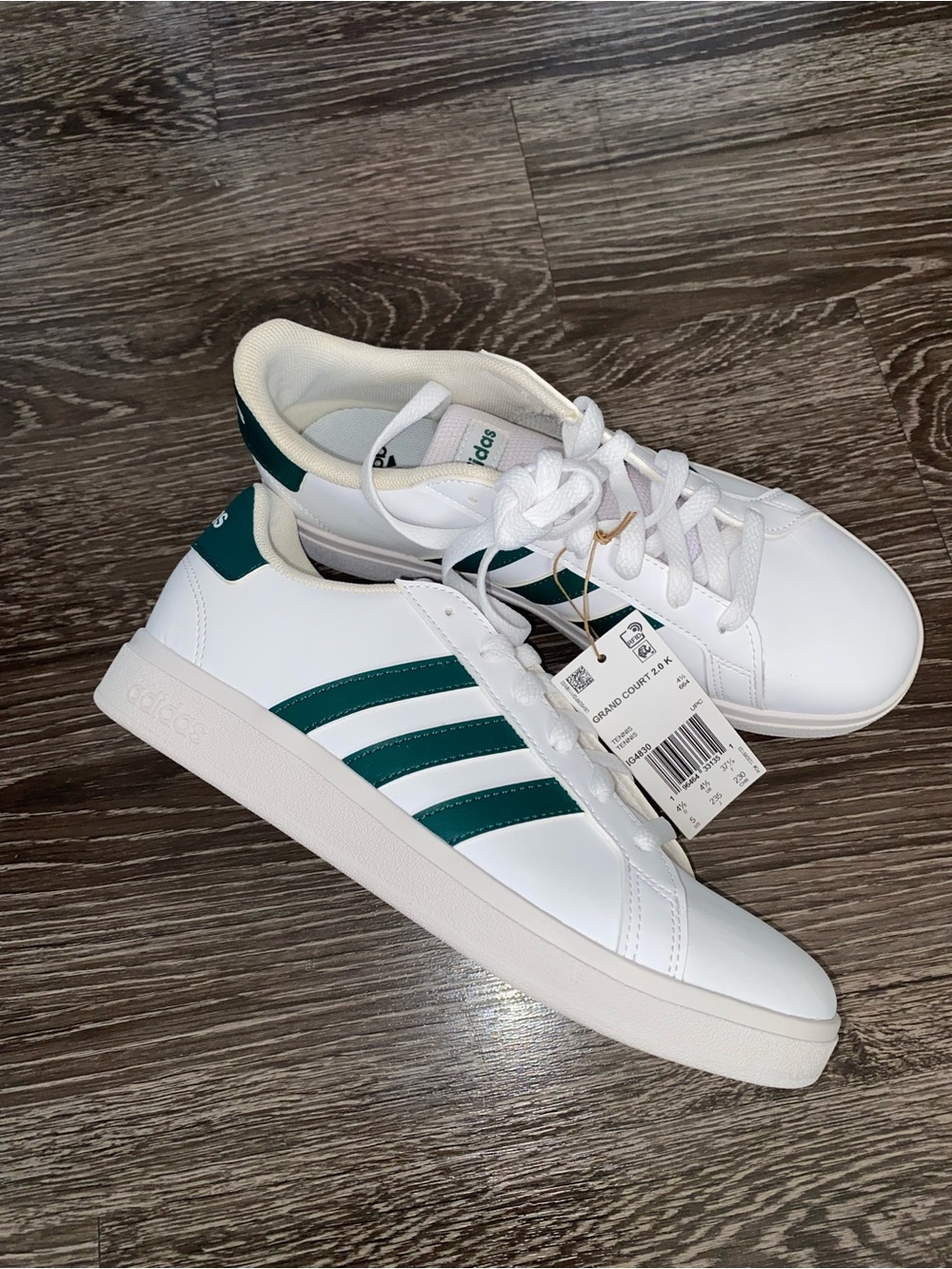 adidas White Sneakers with Dark Green Stripes